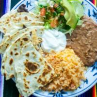 Quesadilla Plate · Your choice of Beef or Chicken Fajita with Shredded Mozzarella White Cheese melted between T...
