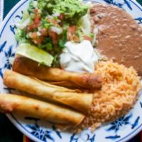Flautas Plate · Three fried Corn Tortillas rolled and stuffed with Chicken. Served with Mexican rice, Refrie...