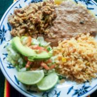 Chicharron Plate · Chicharron (Sauteed Pork) served with Mexican Rice, Refried Beans, Salsa, Lettuce, Tomato, L...