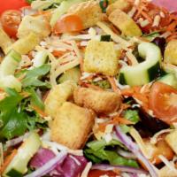 House Salad · Iceberg lettuce, spring mix, tomatoes, red onions, carrots, cucumbers, croutons, and jack/ch...