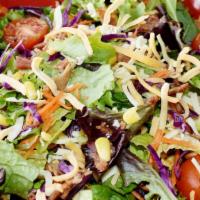 Cobb Salad · Romaine lettuce, spring mix, red cabbage, carrots, corn, bacon, eggs, tomatoes and jack and ...