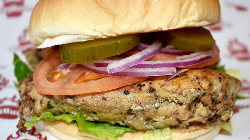 Grilled Chicken Sandwich · Comes with lettuce, tomato, pickles and onions with your choice of flavor.