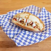 Salchiqueso Dog · Beef hot dog in a warm bun with cole slaw, potato stix, mayo, ketchup, kourmet sauce and whi...