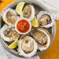 Fresh Oysters · Served on the half shell.