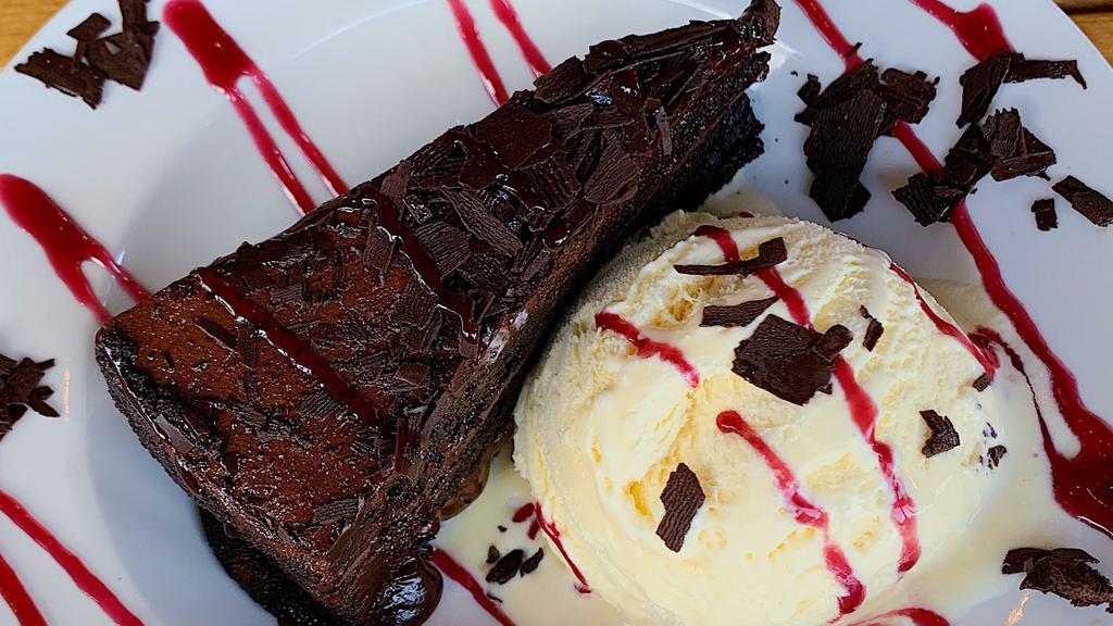 Chocolate Cake · With vanilla ice cream.