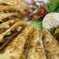 Bbq Quesadillas · Large flour tortillas, shredded cheddar, pico de gallo and your choice of meat.