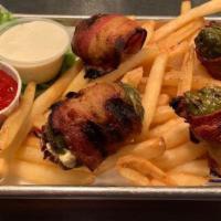 Brisket & Sausage Poppers · 2 pickled jalapenos stuffed with cream cheese & chopped brisket wrapped in bacon.
2 pickled ...
