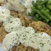 Chicken Fried Steak · 6 oz. hand battered fresh cutlet fried to golden brown and served with cream gravy.  Comes w...