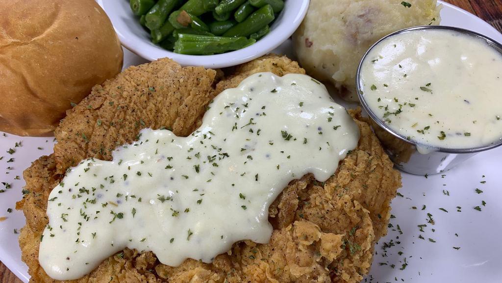 Chicken Fried Chicken Breast · Fresh hand battered chicken breast fried to a golden brown and served w/ cream gravy. Served with a side salad with choice of dressing.