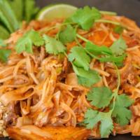 Pad Thai · Pad thai noodles stir fried with egg tofu bean sprouts crushed peanuts crushed peppers and l...