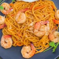 Garlic Noodles · Noodles stir fried with garlic carrots and house sauce topped with parmesan cheese.