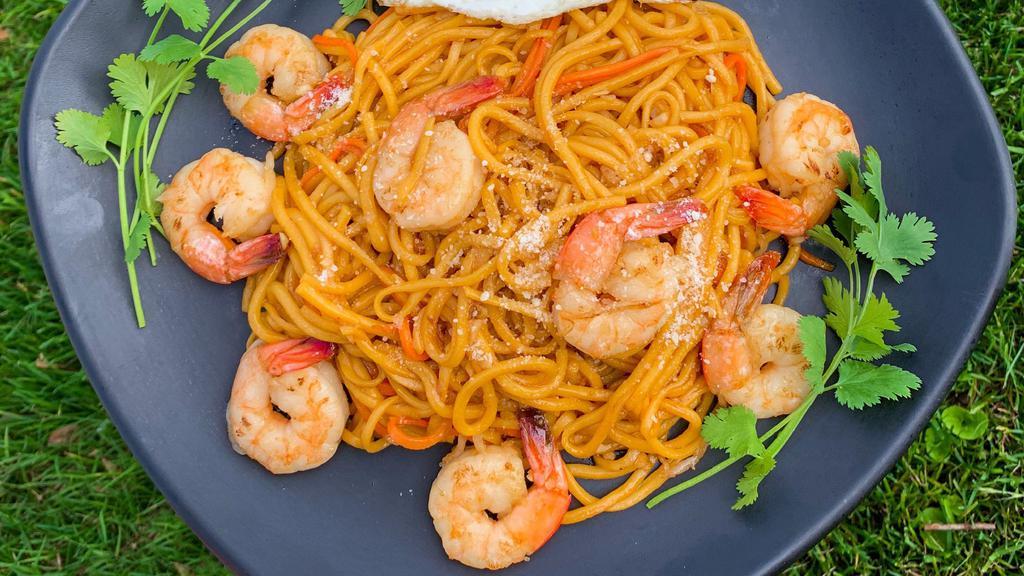 Garlic Noodles · Noodles stir fried with garlic carrots and house sauce topped with parmesan cheese.