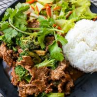Beef & Broccoli With Rice · Beef and broccoli in brown sauce served with steamed rice and salad.