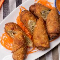 Thai Egg Rolls (4 Pieces) · Fried vegetarian egg rolls stuffed with silver noodle, carrot and cabbage. Served with sweet...