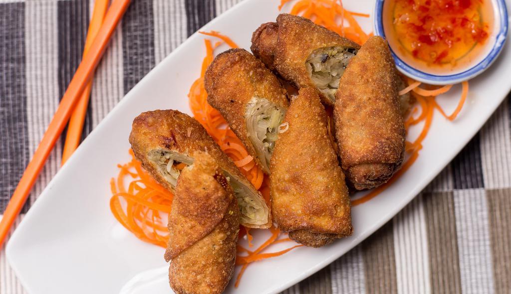 Thai Egg Rolls (4 Pieces) · Fried vegetarian egg rolls stuffed with silver noodle, carrot and cabbage. Served with sweet and sour sauce.