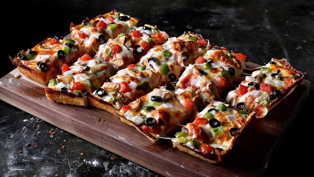 Veggie (8 Corner) · Pizza sauce, premium mozzarella, mushrooms, onions, green peppers, black olives and tomatoes. 400 cal.