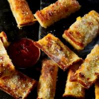 Jet'S Triple Cheese Turbo Stix · 12pc. Freshly baked bread with premium mozzarella & cheddar, topped with butter, garlic & ro...