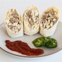 Egg White Turkey Sausage Breakfast Burrito · Egg whites mixed with homemade lean turkey sausage. Wrapped in a flour tortilla with a touch...