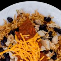Naked Chicken Enchilada · Mexican spiced chicken breast and authentic sauce served over rice and black beans with no t...