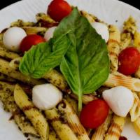 Caprese Pasta Salad · Fresh mozzarella balls, grape tomatoes and fresh basil tossed with penne pasta and finished ...