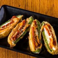 Jalapeno Popper (4 Pieces) · jalapeno stuffed with spicy tuna, cream cheese deep fried in tempura batter