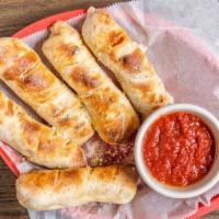 Luke'S Pepperoni Rolls · Made to order! Stuffed with cheese and pepperoni, served with a side of our red sauce.