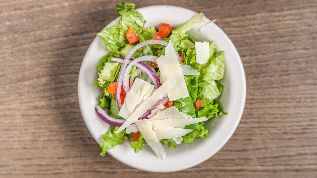 Julian'S House Salad · Mixed greens with diced tomatoes, red onions, and shaved Parmesan cheese. Italian or ranch dressing.