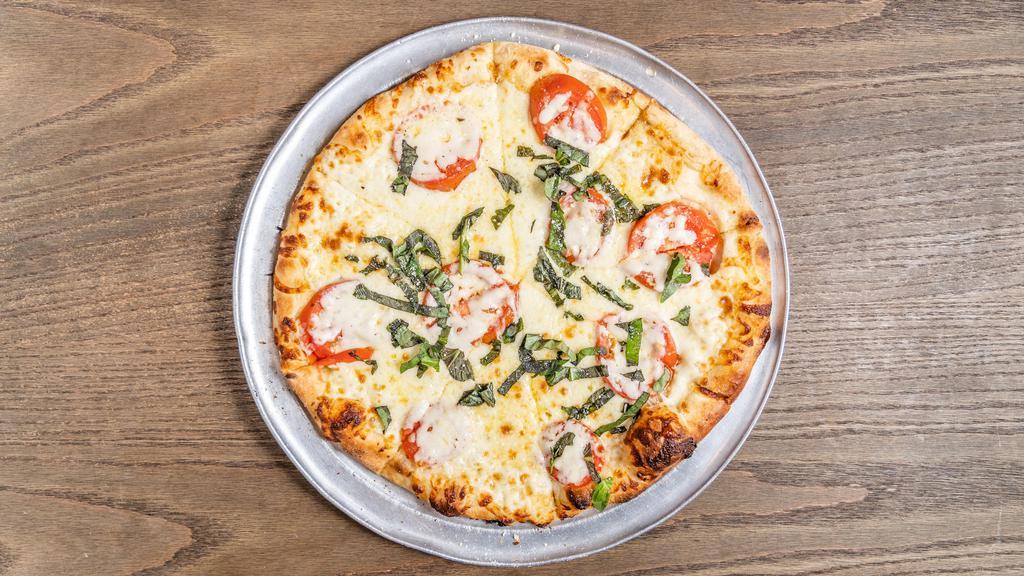 Margherita · Extra virgin olive oil, fresh garlic, fresh basil, sliced Roma tomatoes, Mozzarella cheese and Romano cheese.
No sauces added to these pizzas. Available on request.
