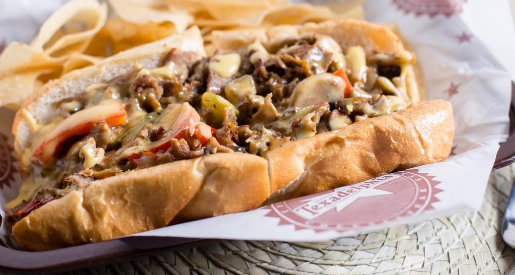 South Philly · Beef or Chicken, Grilled Onions, Mushrooms, Bell Peppers, Housemade Cheese 