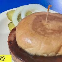 Bbq Bologna · Fried beef bologna smothered in BBQ sauce. Also comes with a side of onions and picklesKetch...
