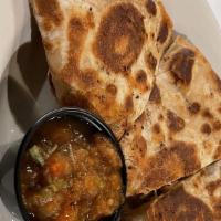 Cheese Quesadilla · Flour tortillas filled with a two cheese blend and pico de gallo. Guacamole, salsa, and sour...