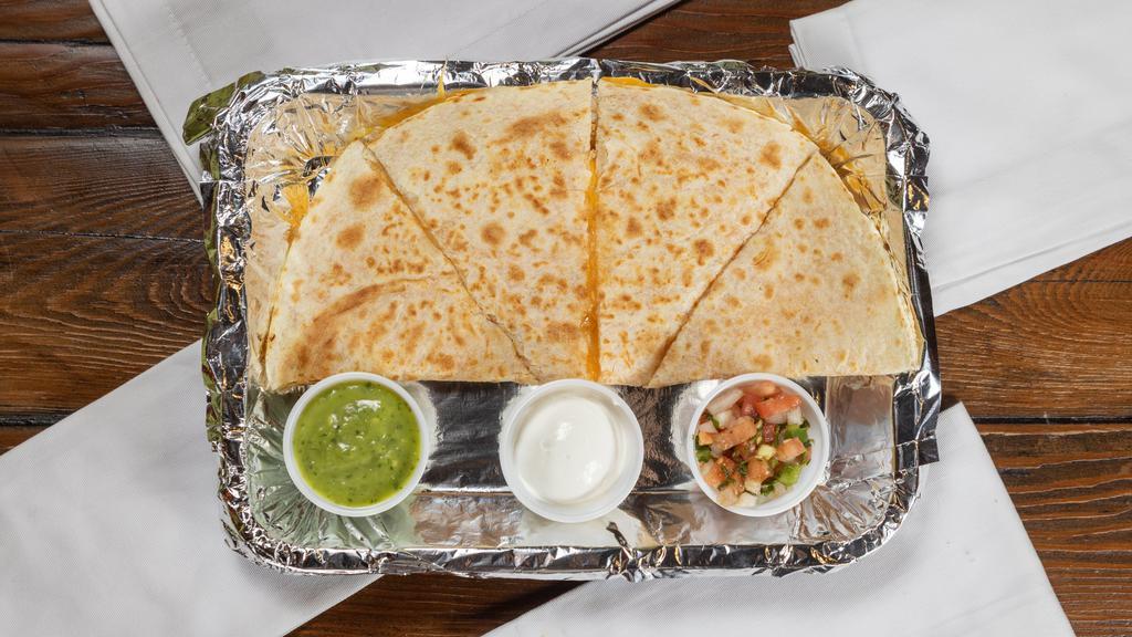 Quesadilla · Fire braised chicken, steak, al pastor pork, or 2 tamales – your choice of 4 or 8 slices grilled to perfection. Served with pico de gallo, sour cream, avocado salsa, and arbol salsa. Steak for additional charge.