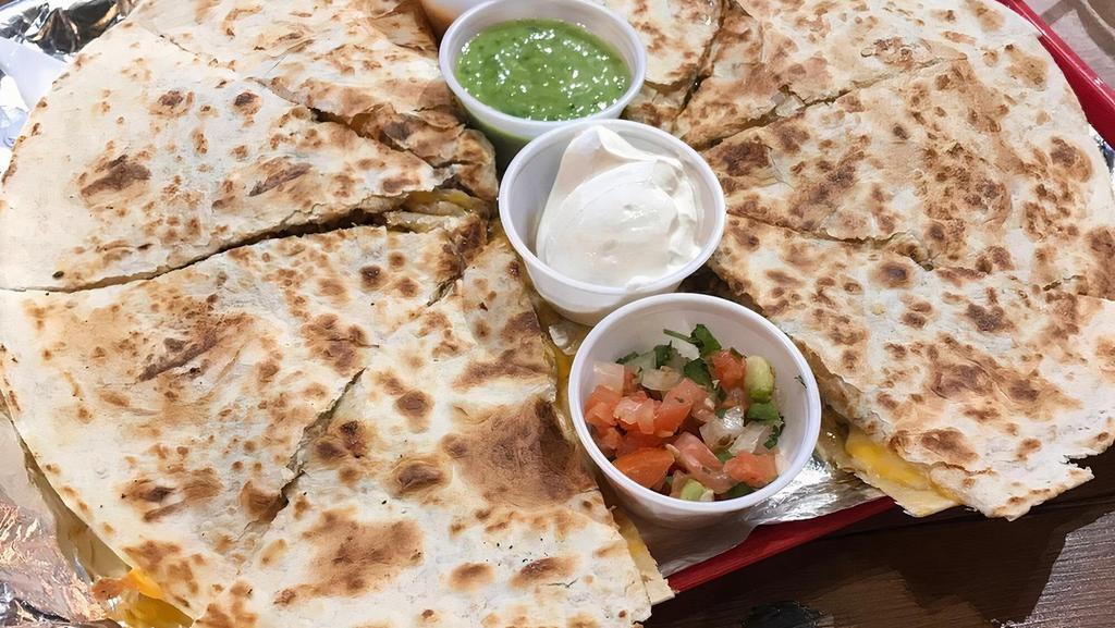 Kids Quesadilla · Fire braised chicken, al pastor pork, or steak. Served with rice and sour cream.