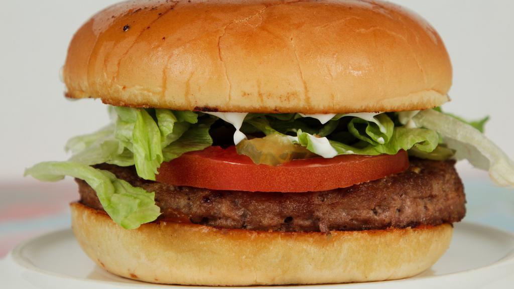 El Americano Burger · Burger (1/3 lb.) / Lettuce / Mayo / Tomato / Pickles / Wicho’s Sauce