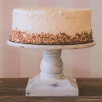 Coconut Rum Cake · Spectacular coconut cake made with real shredded coconut flakes, covered and filled with aut...