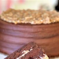German Chocolate · This rich and tender German chocolate cake is topped and filled with a coconut pecan filling...