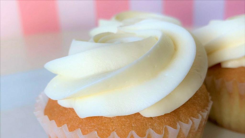 Vanilla Rum Cupcakes · Our Traditional Vanilla Rum Cupcake is frosted with a authentic vanilla buttercream.