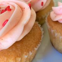 Vanilla-Strawberry · Vanilla rum cupcake frosted with fresh strawberry buttercream