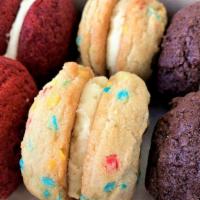 Mini Whoopie Pies Box  · Assortment of our delicious whoopie pies, vanilla, chocolate and red velvet.