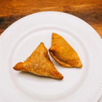Keema Samosa · Most popular. Crispy pastry shell with lamb, minced herbs, and spices.