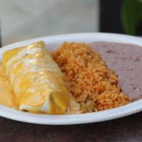 Burrito Con Queso · A large flour tortilla filled with ground beef and topped with chile con queso. Served with ...