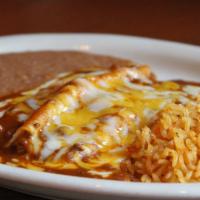 Niño Enchilada · Served with rice and refried beans.