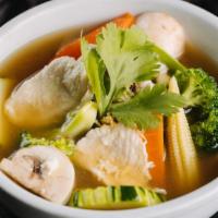 Vegatables Soup · Chicken and mixed vegetables in chicken broth and cilantro garnish