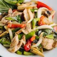 Sweet Basil · Bell pepper, onions, mushrooms, snow peas and baby corn stir fried in spicy Thai basil sauce.