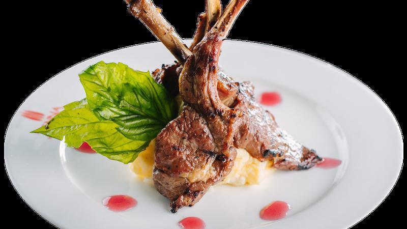 Lamb Chops · Lightly medium grilled served with red wine sauce and mashed potatoes.