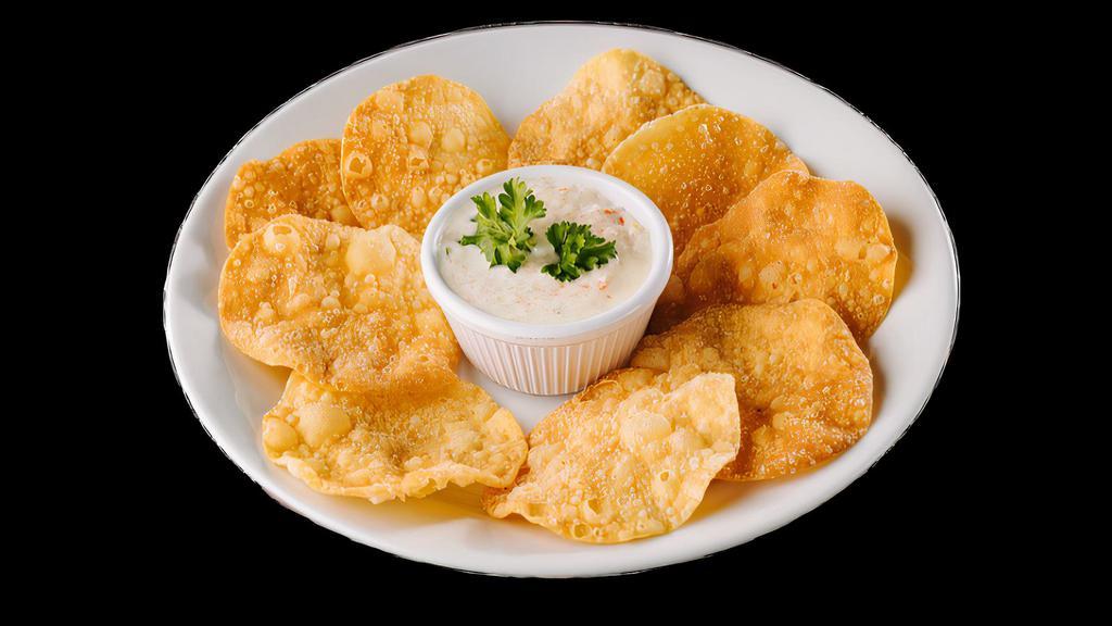 Crab Ragoon Dip · Minced crab meat in cream cheese served with Asian chips.