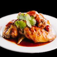 Chicken Wings · Your choice of tom-yum, pepper garlic or teriyaki flavor.