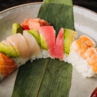 Rainbow Roll · Crab meat, avocado and cucumber top with tuna, salmon, yellowtail and shrimp