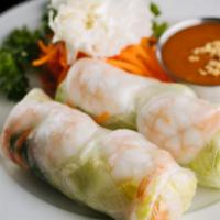 Imperial Rolls · Shrimp, fresh lettuce, cilantro, carrots wrapped in rice paper and served with sweet peanut ...