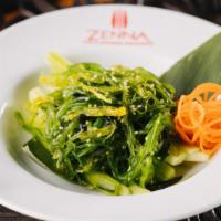 Seaweed Salad · Organic seaweed and chives with ginger vinaigrette.
